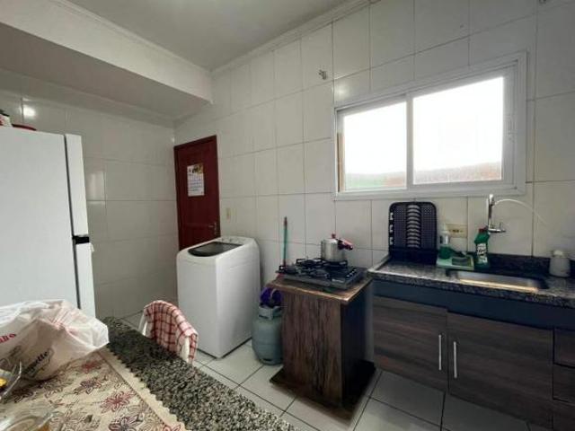 Casa de condomínio com 2 dormitórios à venda, 52 m² por R$ 355.000 Tude Bastos Praia Grande/SP