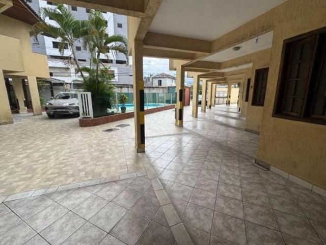Casa de condomínio com 2 dormitórios à venda, 62 m² por R$ 430.000 Vila Guilhermina Praia Grande