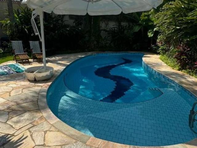 Casa de condomínio com 348 m², 4 quartos sendo 4 suítes à venda no bairro Praça da Baleia