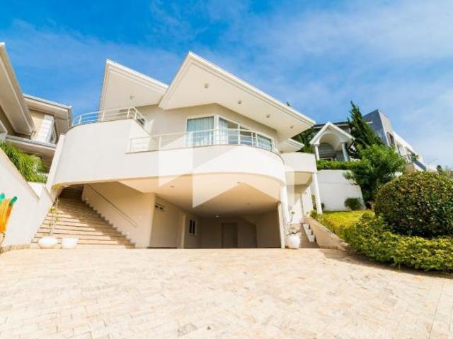Casa de condomínio com 431.49 m², 4 quartos sendo 4 suítes para alugar no bairro Taboão