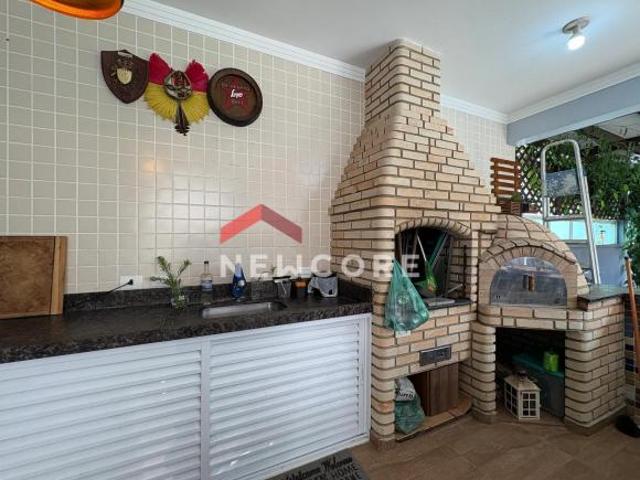 Casa de condomínio em Rua Oito Jardim Três Marias Peruíbe/SP
