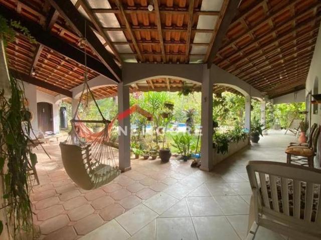 Casa de condomínio em Rua das Palmeiras Bougainville Residencial V Peruíbe/SP