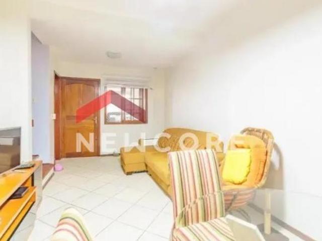 Casa de condomínio em Rua Irmão Augusto Duflot Guarujá Porto Alegre/RS