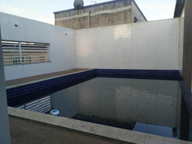 Casa de condomínio em Rua Liberdade Embaré Santos/SP