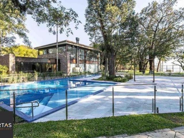 Casa de condomínio impecável no Las Rocas