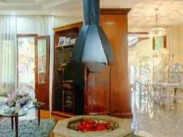 Casa de condomínio para alugar com 450m², 4 quartos e 4 vagas