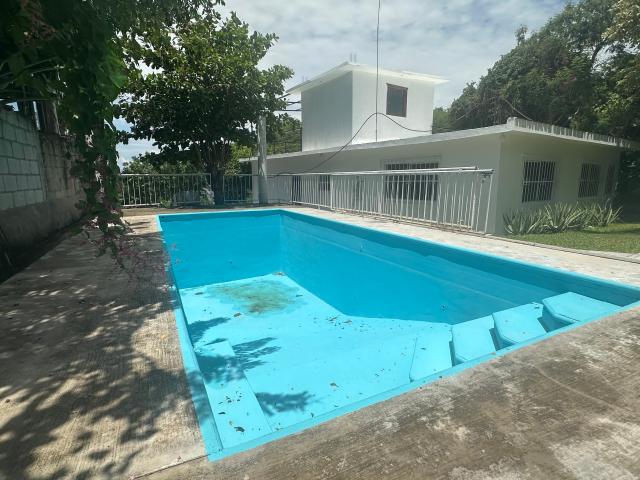 Casa de descanso en Tequesquitengo con alberca, jacuzzi y vista parcial al lago. Clave 6423