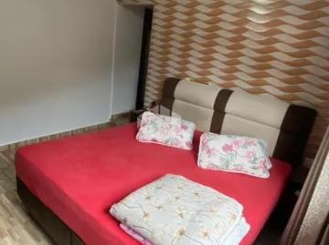 Casa de dois andares com 2 apartamentos superiores não financia