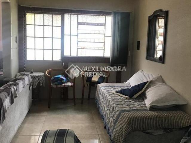 CASA DE DOIS DORMITÓRIOS NO BAIRRO PALACE HOTEL EM CANELA