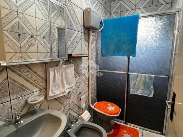 Casa de esquina com amplo terreno bem localizada, no bairro Belvedere
