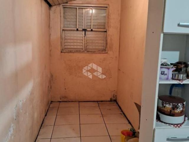 Casa de esquina com 03 dormitórios a Venda na rua Doutor David Rubinstein 4 camobi Santa Maria RS
