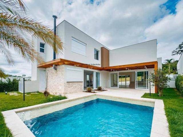 Casa de luxo em condomínio: 4 quartos, 4 suítes, 3 salas, 7 banheiros, 6 vagas de garagem, 400m² em