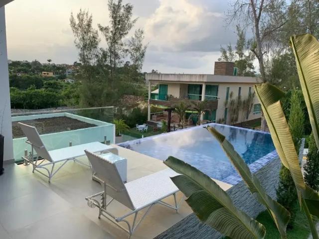 Casa de luxo à venda em Gravatá – Condomínio fechado | 5 suítes | Área Gourmet c
