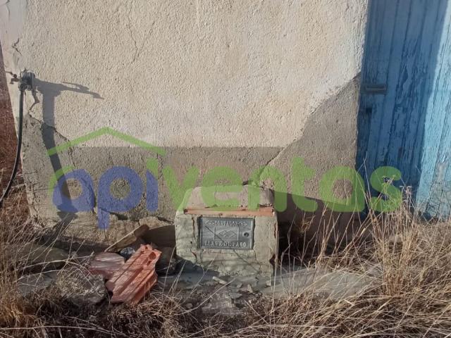 Casa de piedra para restaurar con terreno
