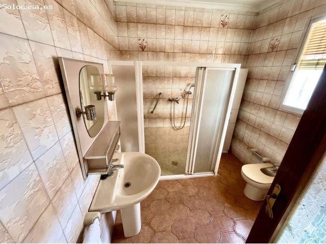 Casa de planta baja con nave garaje y gran huerto