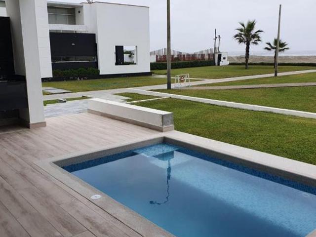 Casa de playaprimera fila piscina incluye dptos mas