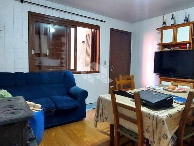 Casa de três dormitórios no Santa Helena