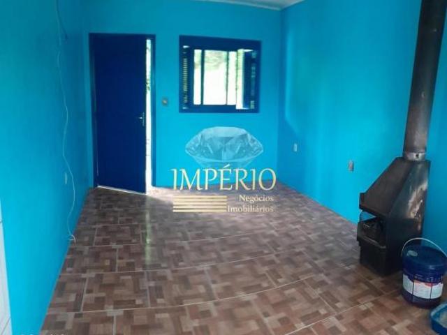 Casa de 2 quartos à venda em Mundo Novo III, Três Coroas RS: 64m² de conforto e praticidade!