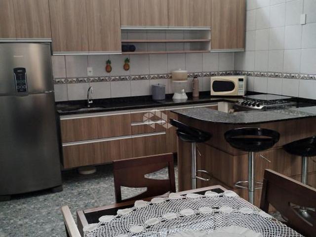 Casa de 3 dormitórios no bairro Glória