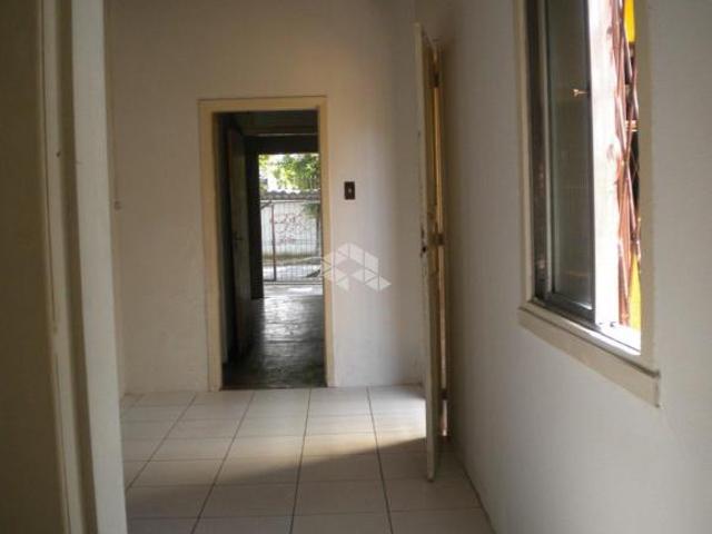Casa de 3 dormitórios para venda no bairro Santo Antônio em Porto Alegre/RS