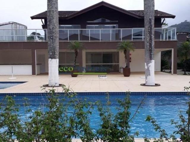 Casa de 3 suítes na Praia de Boiçucanga, São Sebastião SP: churrasqueira, piscina no condomínio
