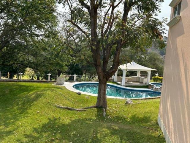 Casa de 4 recámaras con 1300m2 en venta, Club de Golf Santa Fe en Xochitepec, Morelos