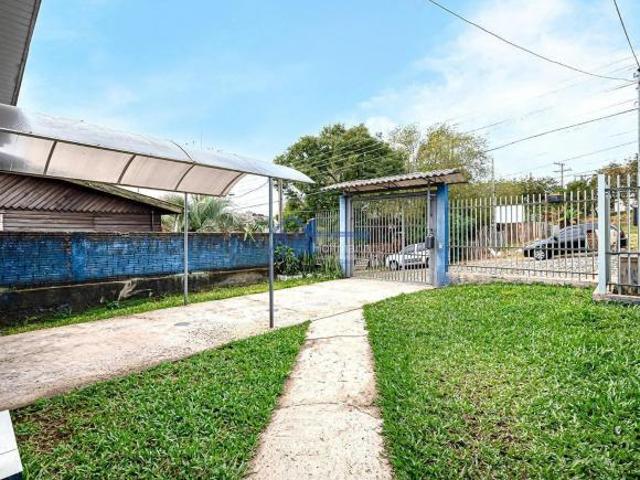 Casa de 70m² a venda em Novo Hamburgo bairro Petropolis, com quintal e churrasqueira