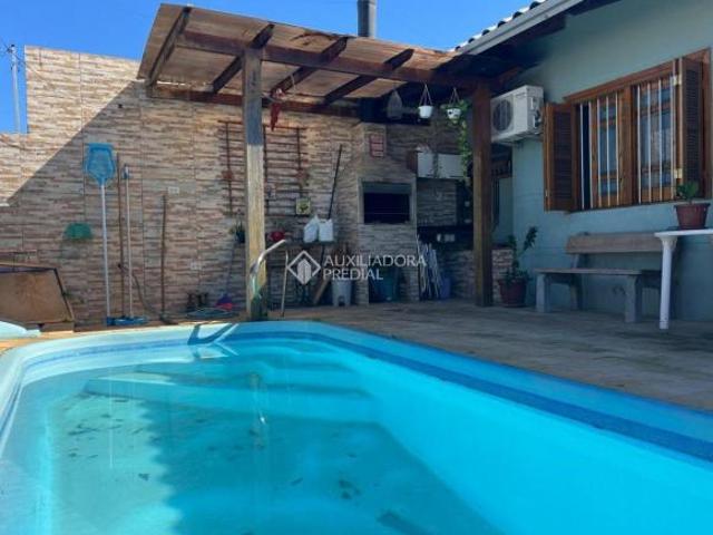 Casa excelente à venda no bairro Santa Rita, em Guaíba