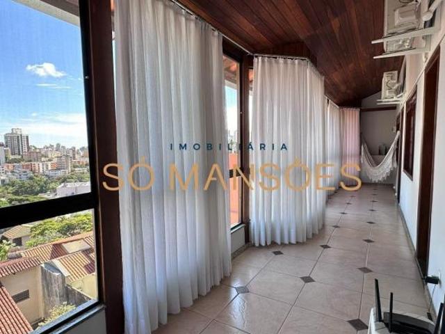 Casa Exclusiva de 398 m² à Venda com 3 Suítes e Vista Deslumbrante no Santa Lúcia, Belo Horizonte