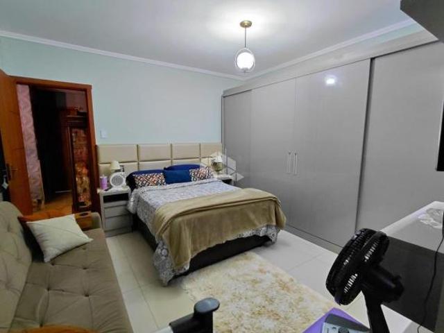 Casa em Alvorada 2 suítes,Piscina Aquecida e vaga de garagem coberta.