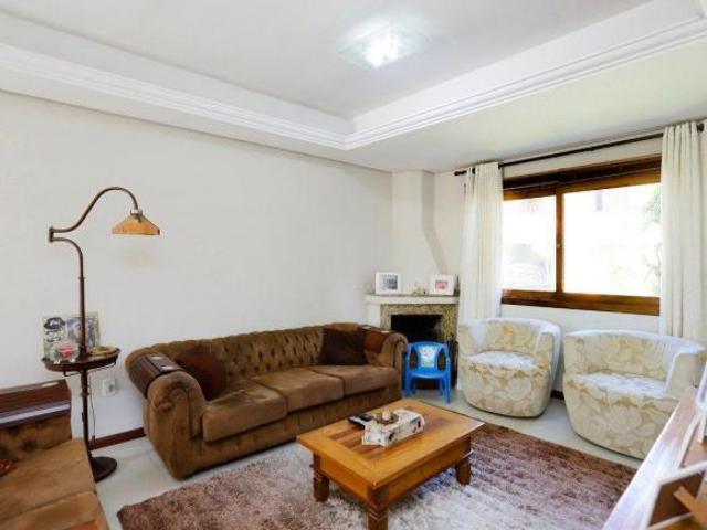 Casa em condomínio 3 dormitórios no bairro Espírito Santo, zona sul de Porto Ale