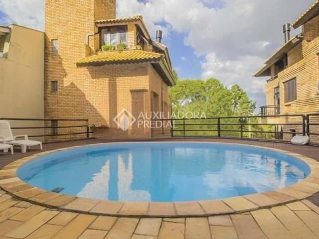 Casa em condomínio 4 dormitórios 1 suíte, à venda no bairro Boa Vista, Porto Alegre