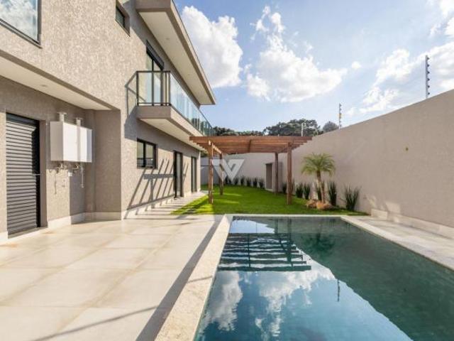 CASA EM CONDOMÍNIO 4 SUÍTES 4 VAGAS COM PISCINA 318M² TANGUA