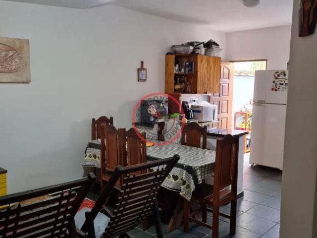 CASA EM CONDOMINIO, COM 2 DORMITORIOS 2 BANHEIROS AREA EXTERNA COM COBERTURA RETRATIL COZINHA AMERIC