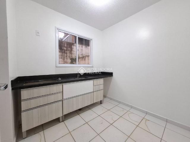 Casa em Condomínio com 2 quartos e 56m² para alugar em Canudos, Novo Hamburgo