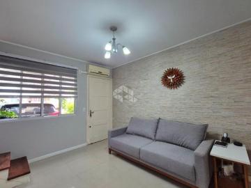 Casa em condomínio com 3 dormitórios e 1 vaga de garagem, no bairro Humaitá, em Porto Alegre