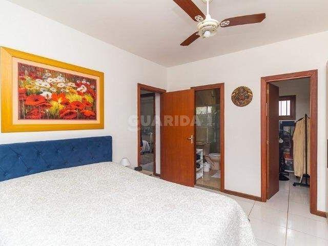 Casa em condomínio com 3 dormitórios sendo 1 suíte no bairro Hípica COD: 15131