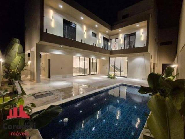 Casa em condomínio com 4 suítes, à venda, 385 m² no Bairro Riviera Tamborlim Americana/SP