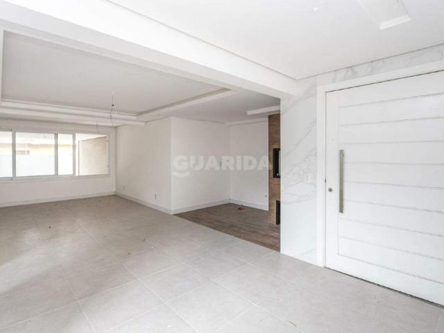 Casa em Condomínio com 4 suítes e 2 vagas de garagem no bairro Tristeza COD: 21575