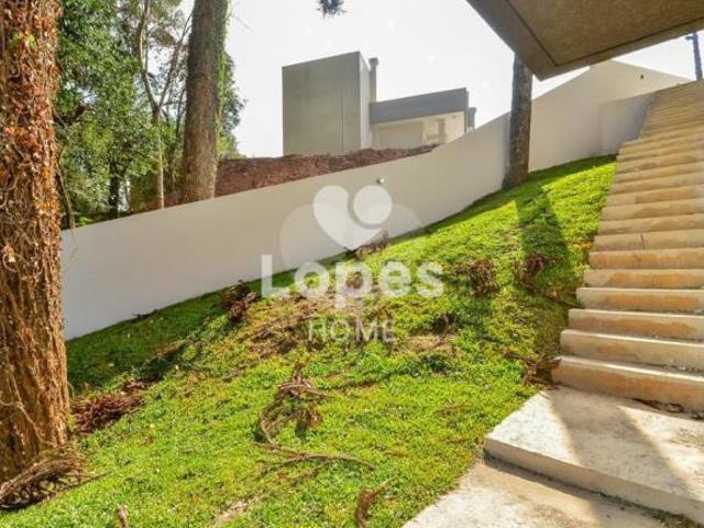 Casa em condomínio com 4 suítes 4 vagas
