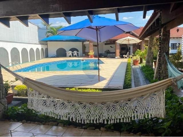 Casa em Condomínio com 5 Suítes para Locação em Bertioga SP