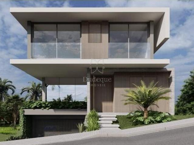 CASA EM CONDOMÍNIO CLUBE COM 4 QUARTOS 2 SUÍTES