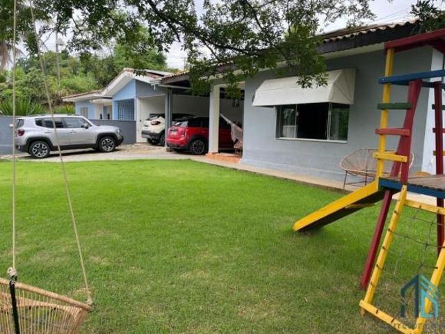 Casa em Condomínio a venda, 04 quartos sendo duas suítes, piscina em Cajati SP