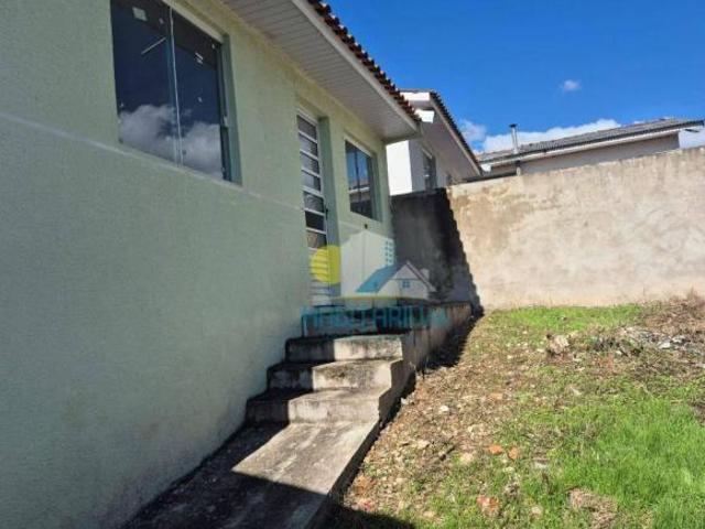 Casa em condomínio não geminada 2 Dorm e quintal