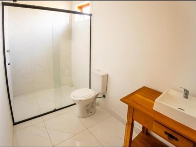 Casa em condomínio náutico Ilha Brasil beira da represa Ijaci com 4 suítes