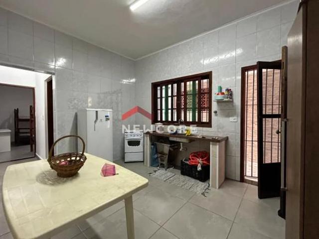 Casa em Rua Maria Inez Bacheschi Rúbio Maracanã Praia Grande/SP