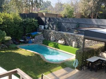 Casa en Arriendo en Peñalolén 4 dormitorios 4 baños