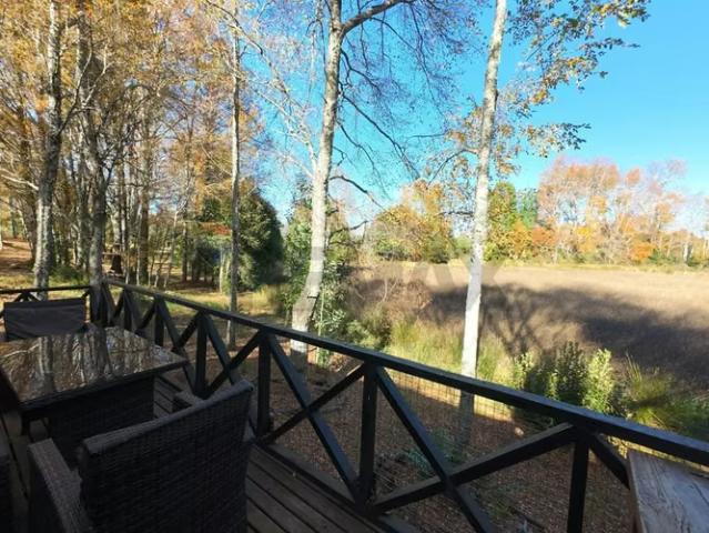 Casa en condominio con laguna natural villarrica | 4 dormitorios por 135000. 00 en Villarrica