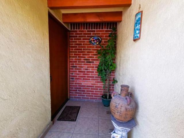 Casa en privada con jardín y terreno amplio, oportunidad Cuautitlán Izcalli