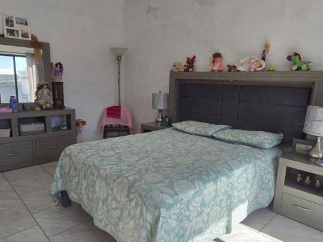 Casa en Venta con Alberca Privada en Hacienda de las Flores, Tejalpa
